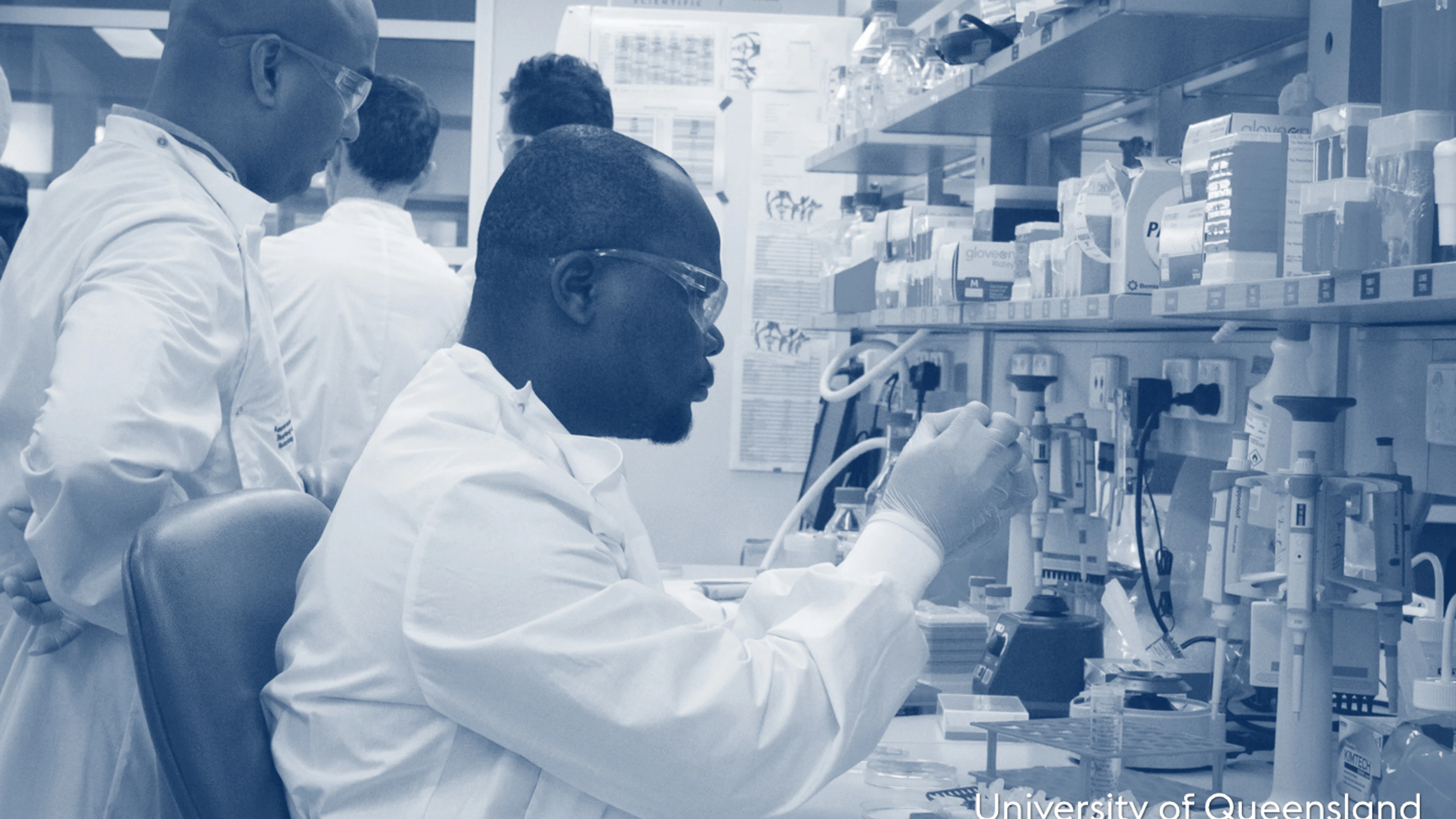 University of Queensland scientists in a lab